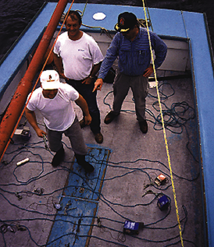 Crew on deck of barge